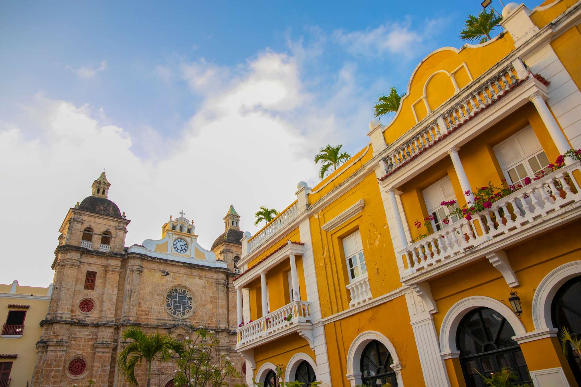 Orange Building Exterior with White Balcony